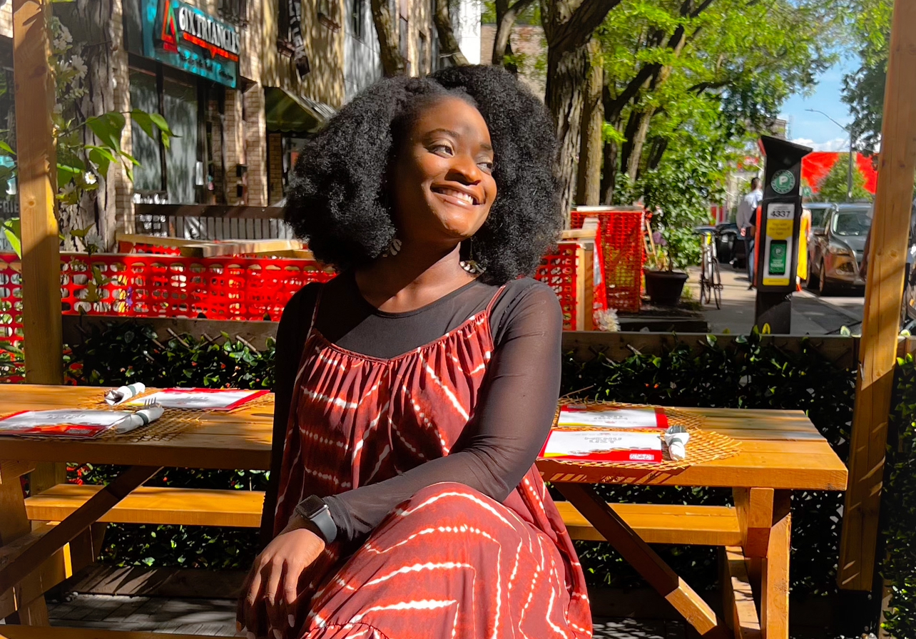 Yvonne Ben at an outdoor cafe