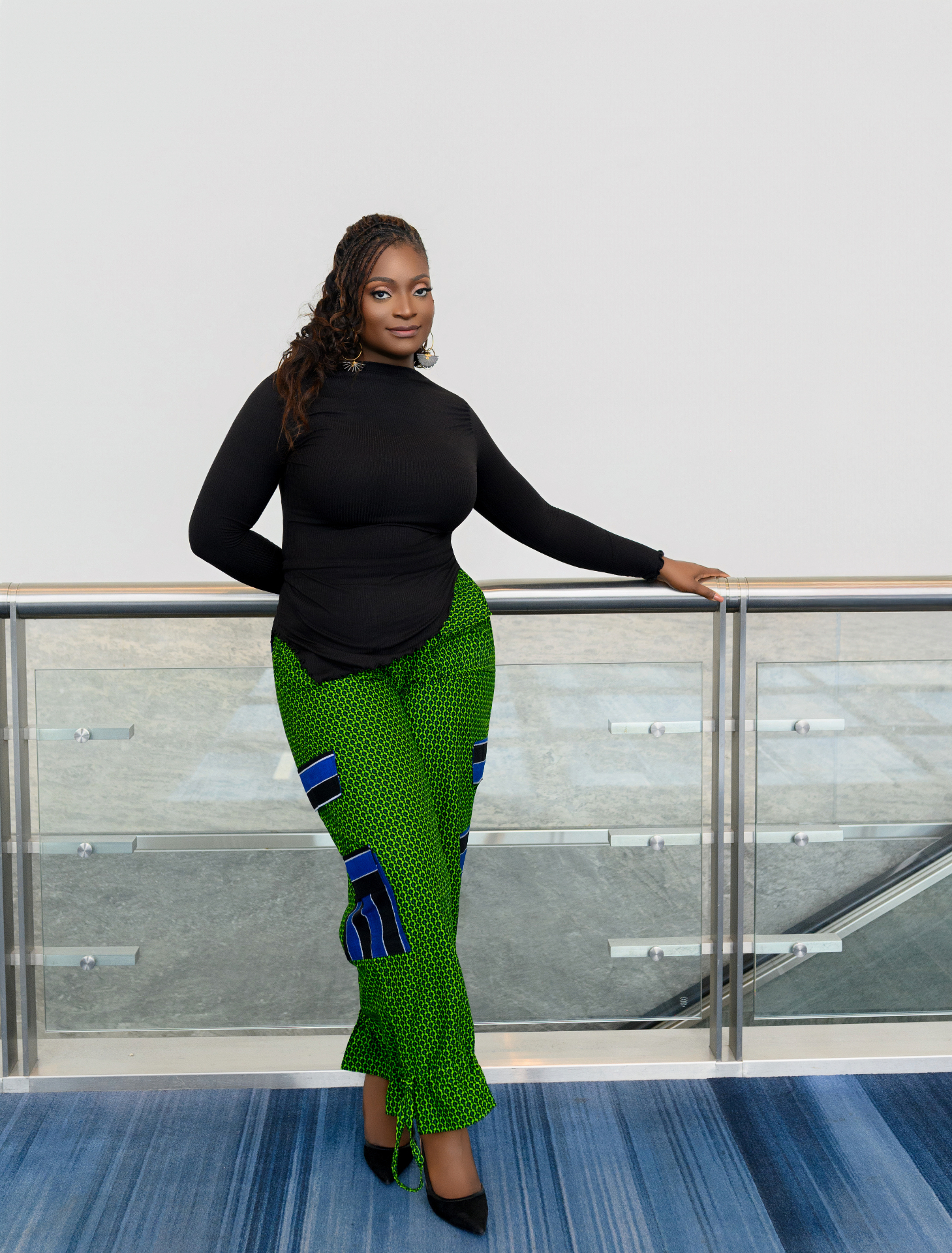 Yvonne Ben in green print trousers
