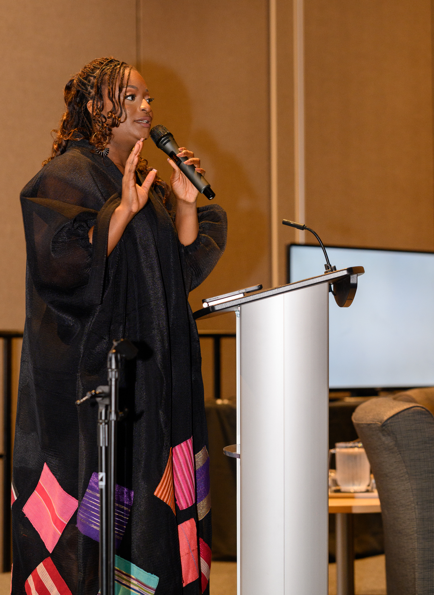 Yvonne Ben speaking on stage